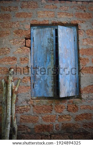The window of an old house. Location: Kerala, India Date 21-10-2018