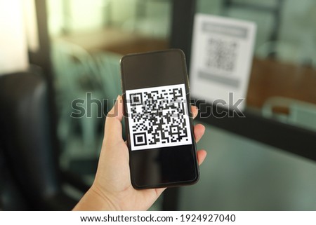 Qr code payment. E wallet. Man scanning tag accepted generate digital pay without money.scanning QR code online shopping cashless technology concept Royalty-Free Stock Photo #1924927040