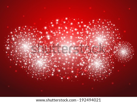 Starry fireworks on red background