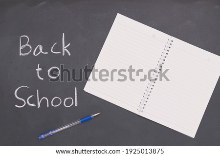 Back to school and education concept book and pen