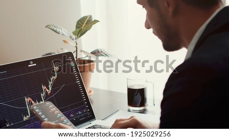 investment stockbroker profit analysis. Stock trading graph price prediction and profit gain. Manager using multiple devices