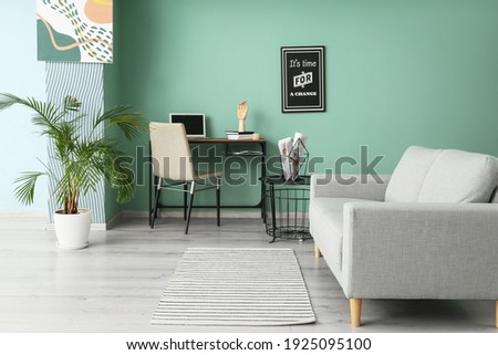 Interior of modern room with sofa Royalty-Free Stock Photo #1925095100