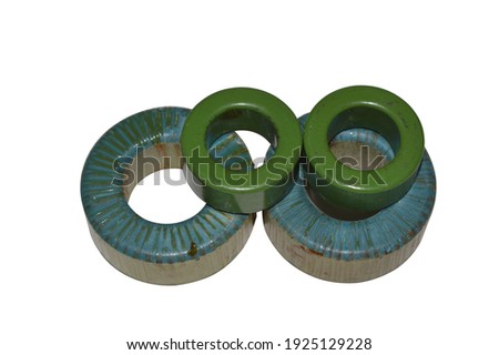 four toroid core for inductance components with green colour and vary size with transparent background Royalty-Free Stock Photo #1925129228