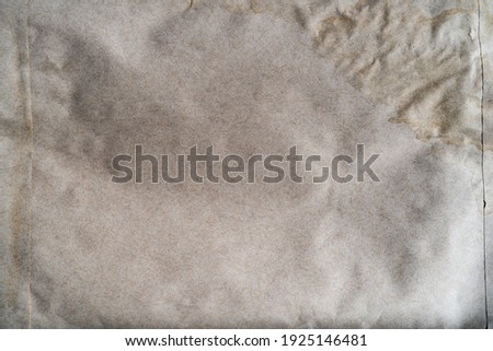 Old gray paper background texture, dirty crumpled paper 