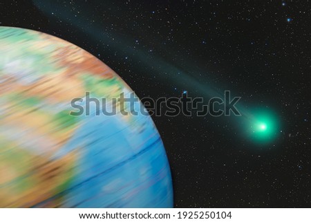 The earth globe rotates against the background of space with a flying comet. Photo of the rotation of the earth globe. Concept of comet and asteroid threat from space.
