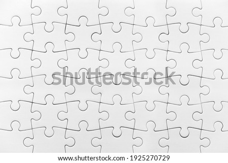 White jigsaw puzzle pattern isolated full background Royalty-Free Stock Photo #1925270729
