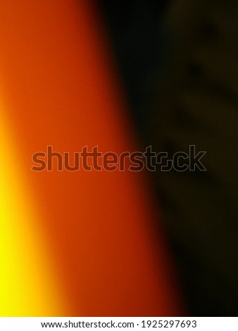 gold and orange background with different lights and particles in blur