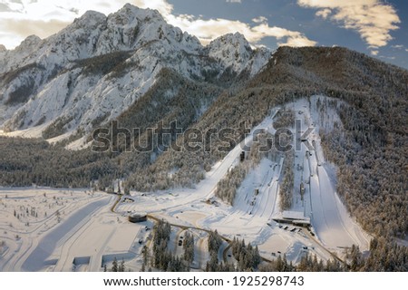Aerial view of Ski Jump in Planica, Slovenia at Ratece near Kranjska gora in winter with snow. Royalty-Free Stock Photo #1925298743