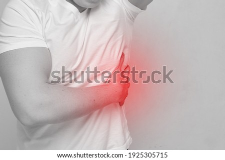Person man experiencing pain from intercostal neuralgia. Royalty-Free Stock Photo #1925305715