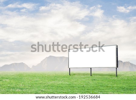 An empty banner on a meadow in summer