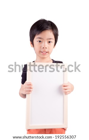 child with whiteboard