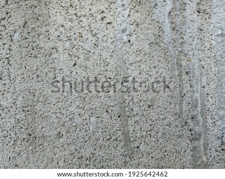 Background made of gray concrete with patterns.