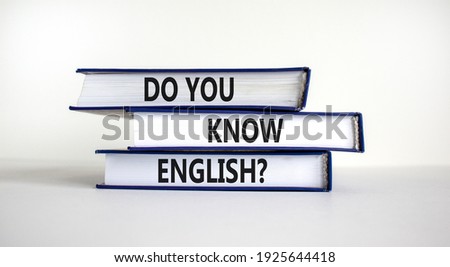 Do you know english symbol. Books with words 'Do you know english'. Beautiful white background. Business, education and do you know english concept, copy space.