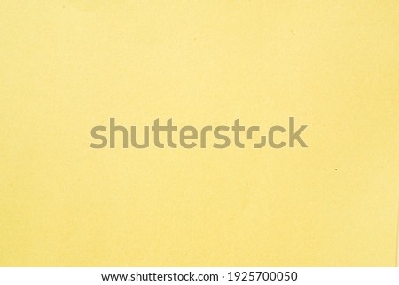 blank light yellow paper for background Royalty-Free Stock Photo #1925700050