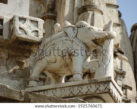Elephant standing on the roof of Chaumukha Mandir Royalty-Free Stock Photo #1925760671