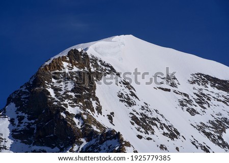 Peak called Mönch (German for monk) seen from Jungfraujoch. Photo taken February 26th, 2021, Switzerland.