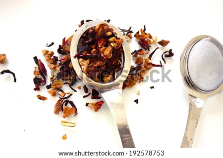 Infuser filled with herbal tea royalty free stock photo for greeting card, ad, promotion, poster, flier, blog, article, social media, marketing, retail, signage, brochure, menu, supermarket