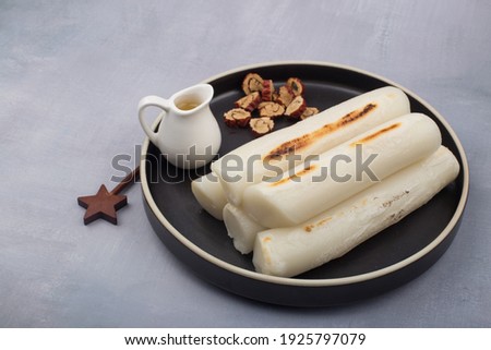broiled bar rice cake korean food. stick of rounded rice cake Royalty-Free Stock Photo #1925797079