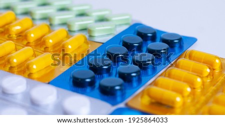 medicine background with packs of pills