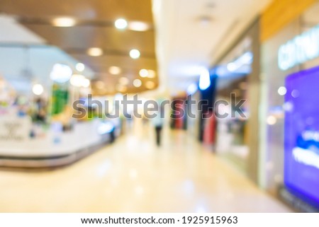 Abstract blur luxury shopping mall and retails in department store interior for background
