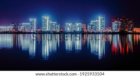 The Kazan Skyline and it's reflection. Modern buildings are illuminated.