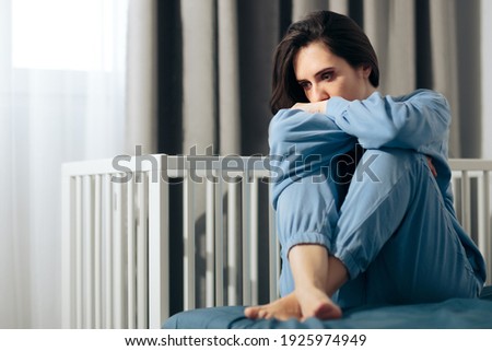 Unhappy Woman Suffering from Postpartum Depression. Sad person dealing with loss and psychological trauma
 Royalty-Free Stock Photo #1925974949