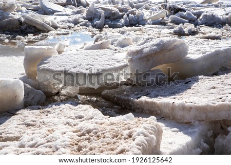 melting river ice isolated on white