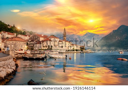 Historic city of Perast in the Bay of Kotor in summer at sunset Royalty-Free Stock Photo #1926146114