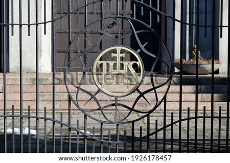 Lithuania, Kaunas, detail of the metal gate of the Catholic church cemetery