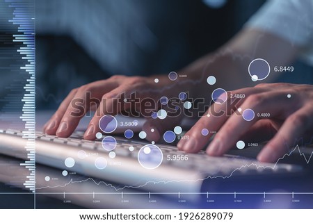 Hands typing the keyboard to research stock market to proceed right investment solutions. Internet trading and wealth management concept. Hologram Forex chart over close up shot.