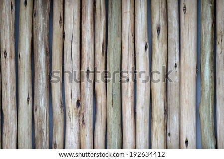 A close up shot of a wooden privacy screen