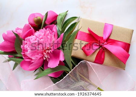 spring flowers. flower arrangement of pink peonies and place for text 