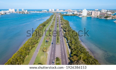 Beach Road. Aerial view on Ocean or shore Gulf of Mexico. Spring break or Summer vacations in Florida. Hotels, restaurants and Resorts. Blue color water. Clearwater Beach FL. United States of America