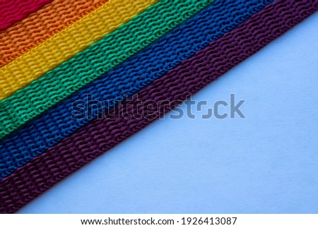 LGBT rainbow ribbon on a white background.Rainbow background. Space for your text.