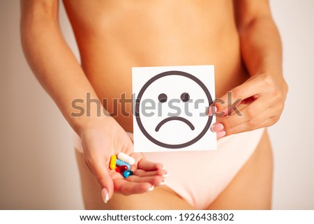 Woman Health, Female Body Holding Sad Smile Card Near Stomach.
