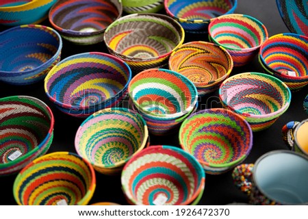 Traditional African crafts for sale at the Shongweni Farmer's Market, near Hillcrest.  Durban, KwaZulu-Natal, South Africa. Royalty-Free Stock Photo #1926472370