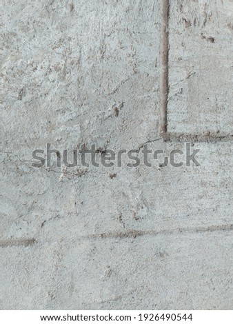 The white cement floor was taken from a high angle to form a background.