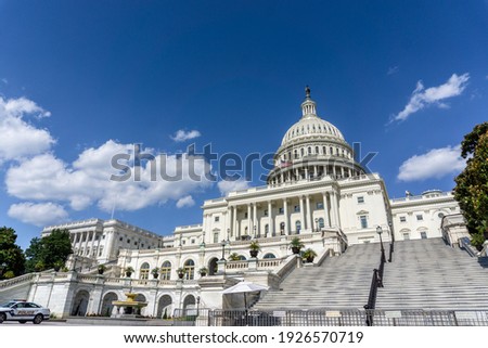 US Capitol with a bright future like the weather Royalty-Free Stock Photo #1926570719