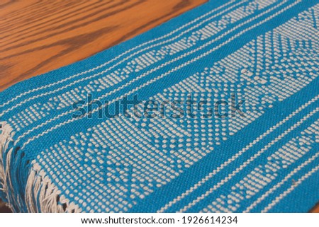 Photograph of an abstract traditional mexican textile texture or background