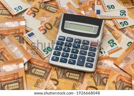 business and exchange concept with euro cash and calculator. economy