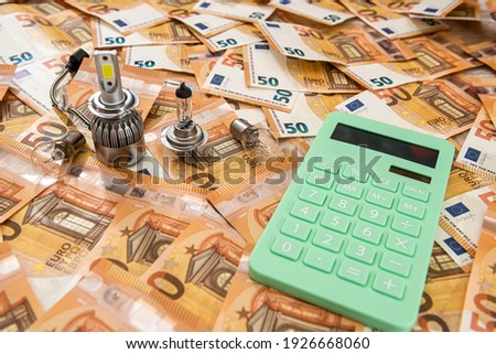 car bulbs on 50 euro bills. saving and finance concept