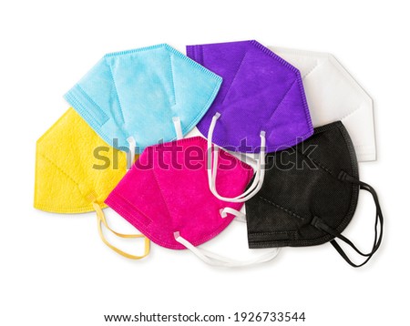 Colorful FFP2 masks isolated on a white background Royalty-Free Stock Photo #1926733544