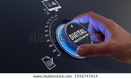 Digital transformation using information technologies as cloud computing, business process management and automation to improve efficiency. Concept with hand turning knob to increase data digitization Royalty-Free Stock Photo #1926747614