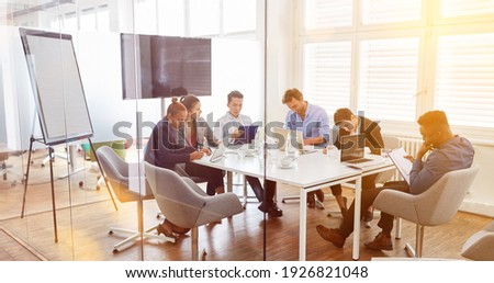 Group of business people make team meeting at business meeting in office Royalty-Free Stock Photo #1926821048