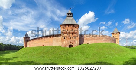 Wall and towers of Novgorod Veliky kremlin, Russia Royalty-Free Stock Photo #1926827297