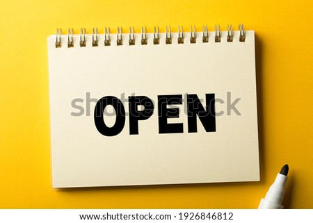 Open Concept is isolated on the yellow background.