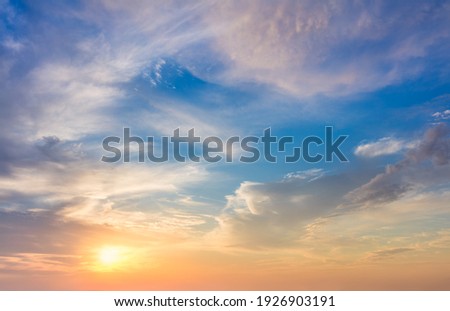 Real sundown sunset  sky with beautiful light clouds and sun, wothout any birds. Huge resolutions Royalty-Free Stock Photo #1926903191