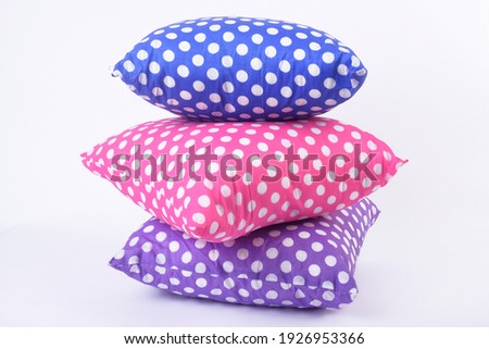 Three soft pillows on white background