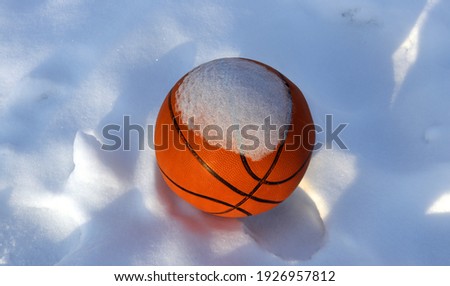 basketball ball in the snow
