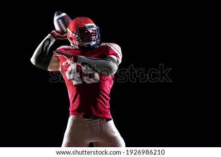American football sportsman player on stadium. 